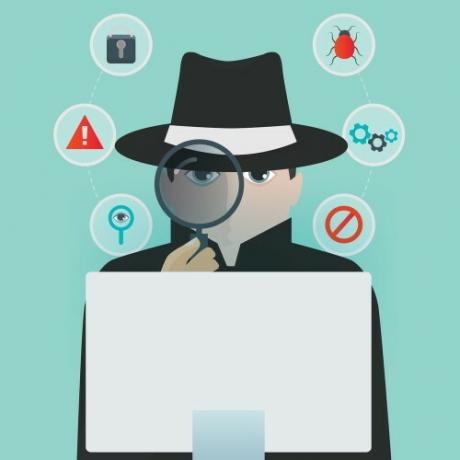 Alguien espiando una computadora para representar spyware